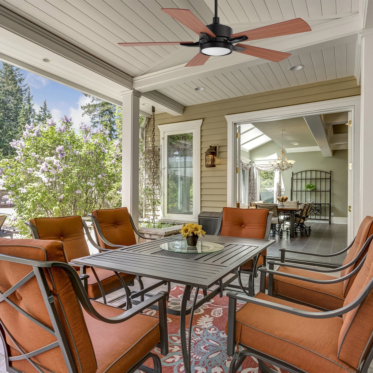 Apex 52-inch modern outdoor smart ceiling fan with integrated LED light, ideal for covered patio spaces, featuring sleek blades and contemporary design. 