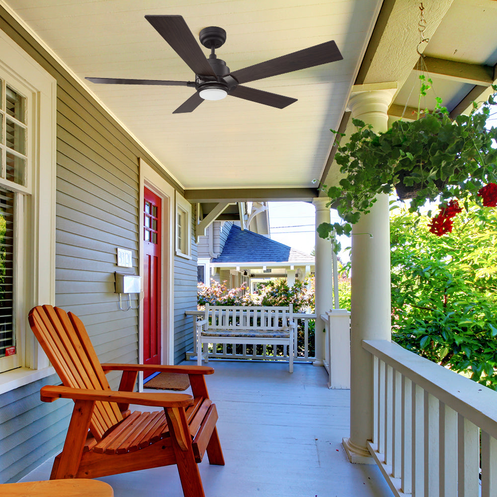 Outdoor smart fans ASPEN installed in the covered porch with 5 dark wood blades and black motor housing. 