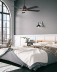 Carro ASPEN outdoor ceiling fan, downrod mount design, have 5 black fan blades, installed in a modern bedroom. 