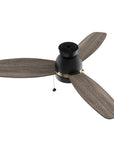A close up detail of Carro Troyes 48 inch pull-chain ceiling fan, with Black and gold DC motor housing and 3 wood fan blades. 