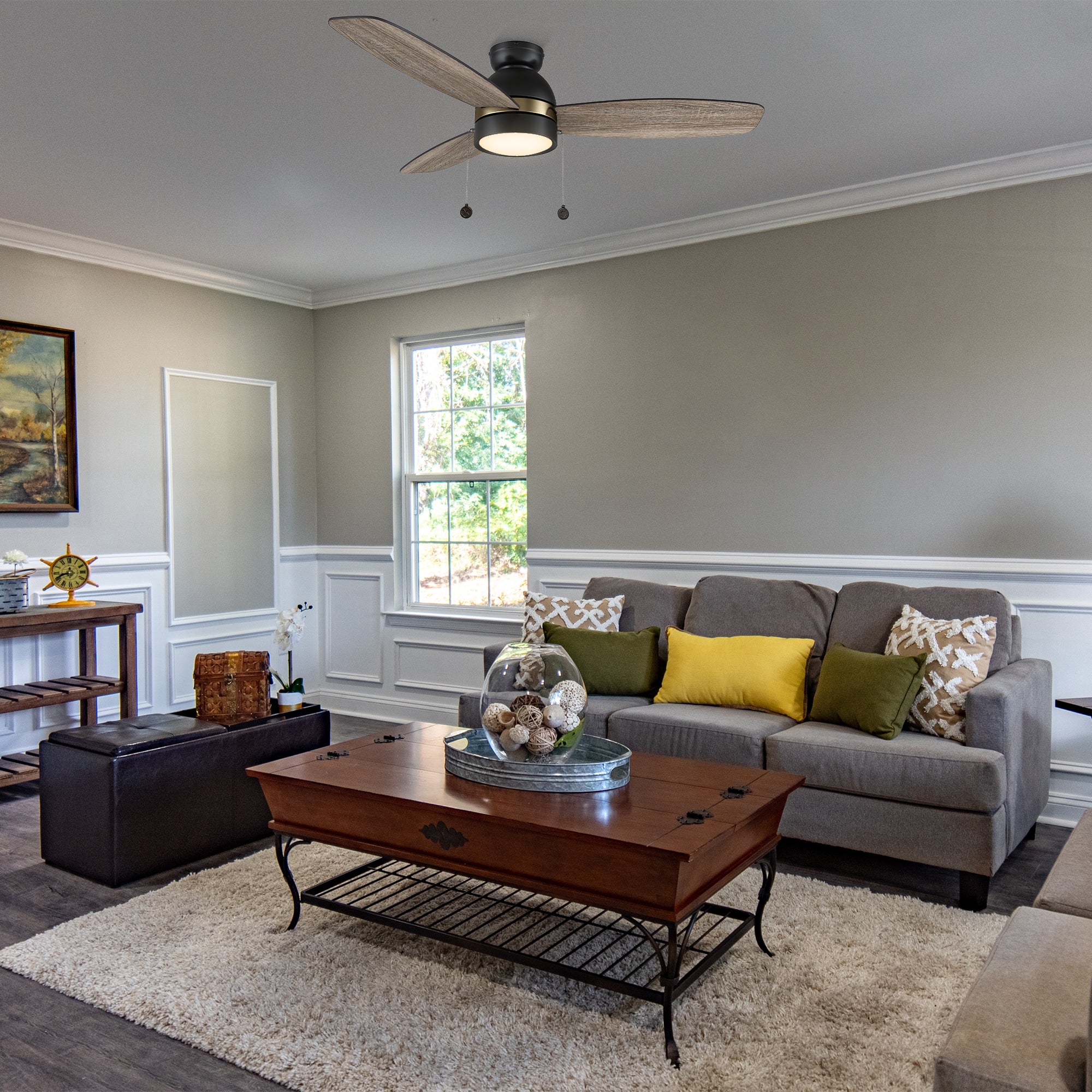 Carro Troyes 52 inch pull chain ceiling fan, light wood design, and an integrated 4000K LED cool light, low profile, decor in a livingrom. 