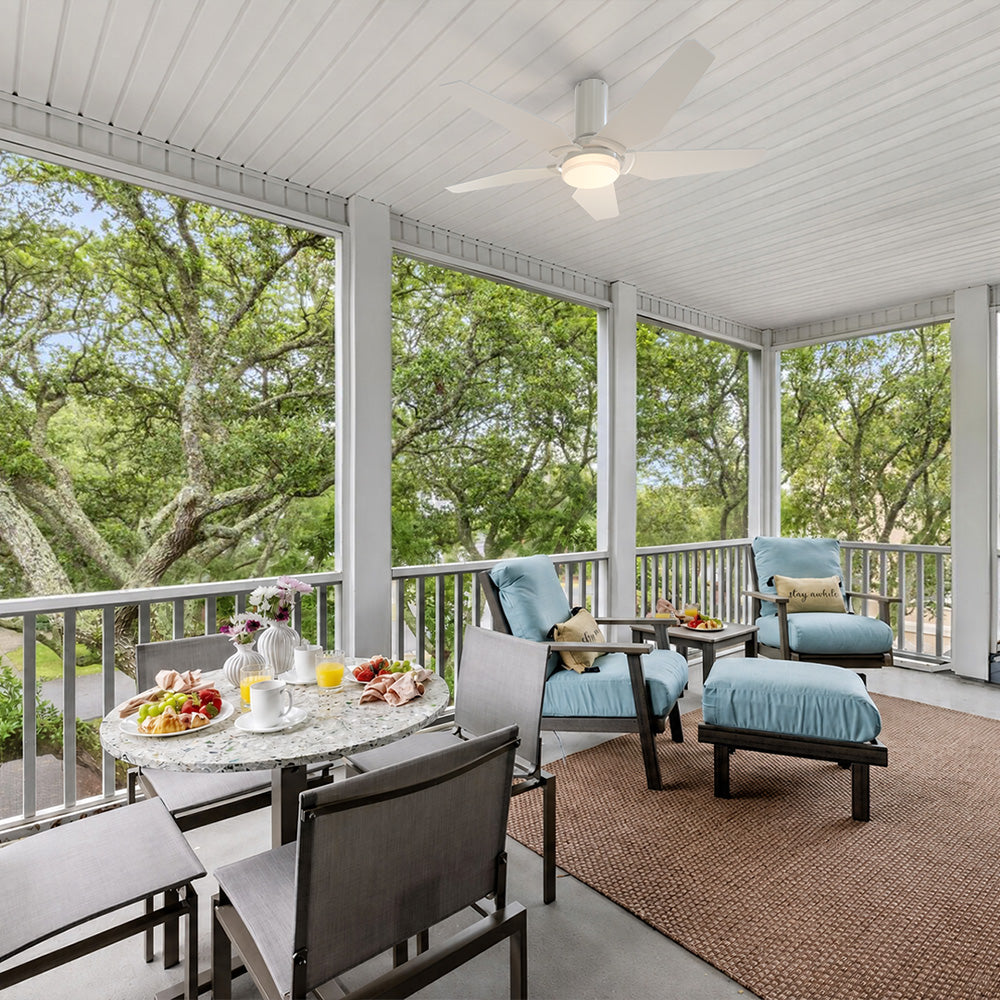 Smafan Carro 48 inch Voyager outdoor ceiling Fan, 5 pure white plywood fan blades, low profile, flush mounted in a covered patio. 