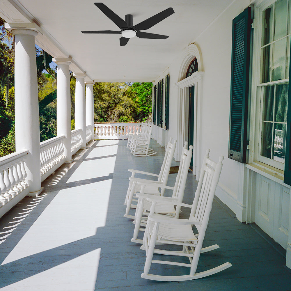 Smafan Carro 52 inch Voyager low profile outdoor ceiling Fan, 5 black plywood fan blades, flush mounted in a covered porch. 