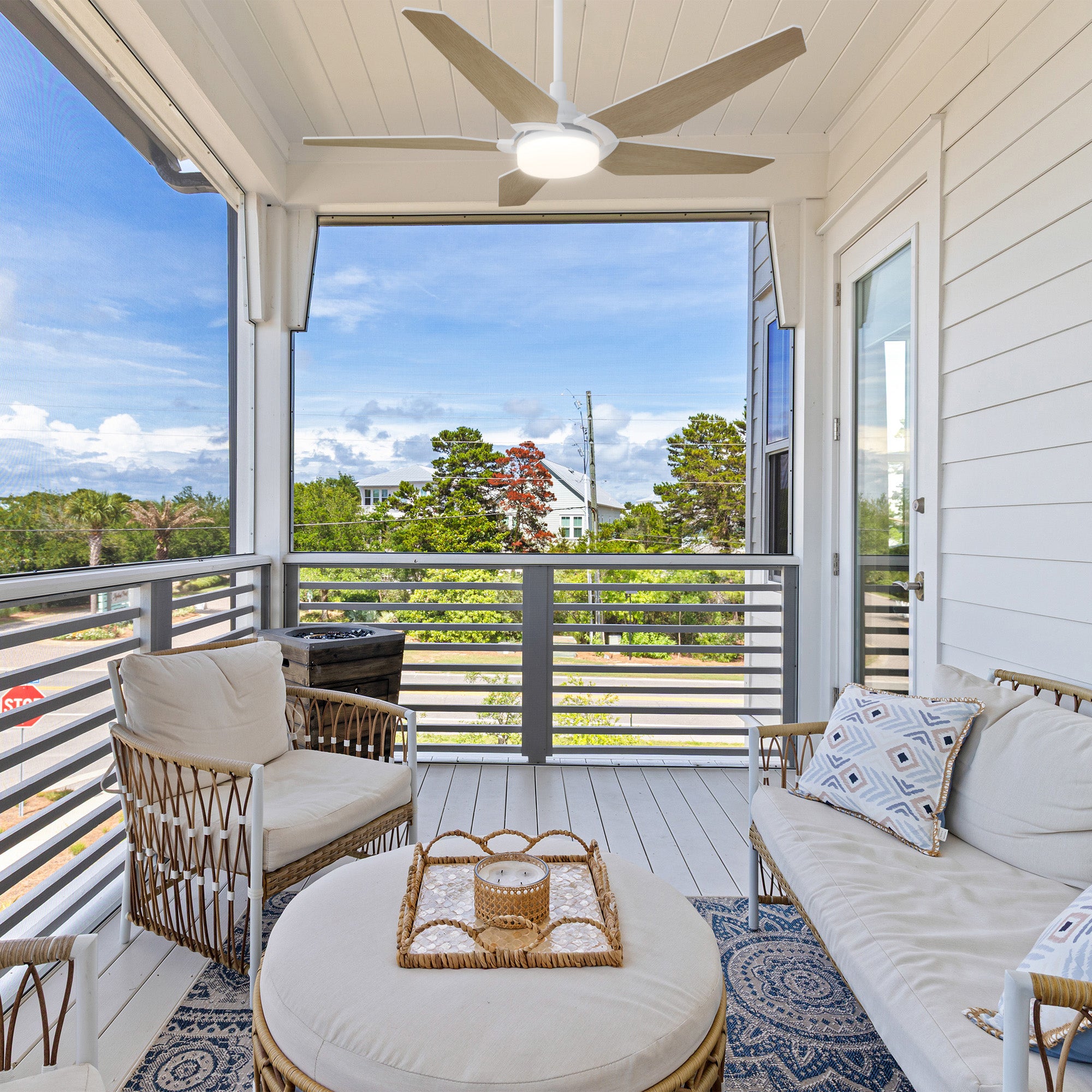 Smafan Voyager 52 inch smart outdoor ceiling Fan with light kit, light wood fan blades design, 6 inch extended rod included, mounting in a outdoor balcony rest area. 
