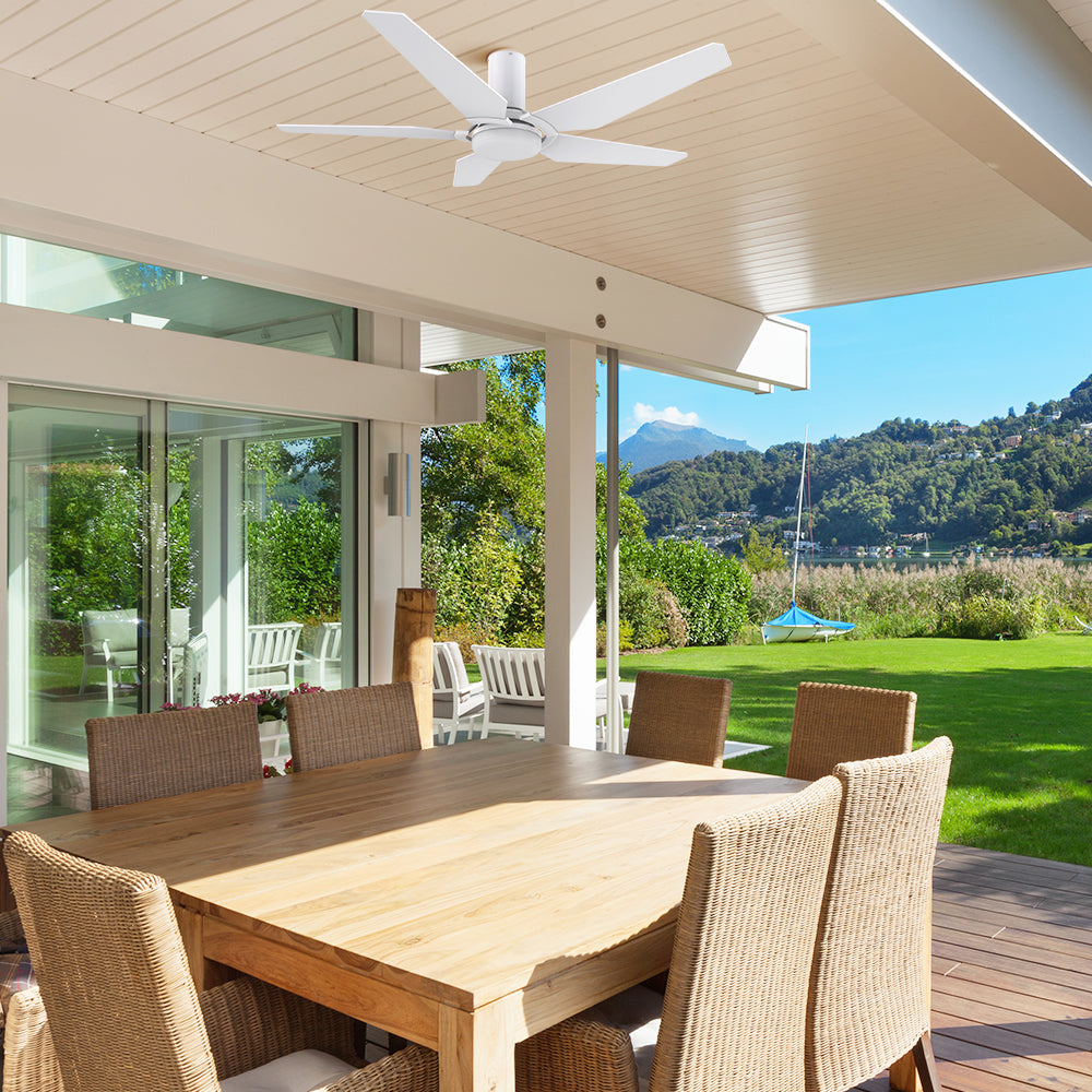 Smafan Carro 52 inch Voyager outdoor ceiling Fan, 5 pure white plywood fan blades, low profile, flush mounted in a covered patio. 