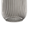 Smafan Cygnus Pendant Light Collection features a translucent elongated ribbed glass shade that creates an eye-catching glow. Hanging from a rich gold tone brass finish canopy that enhances its modern sophistication. Place over dining areas, seating areas, and more for a dramatic look. Its versatile look can complement most any room style.