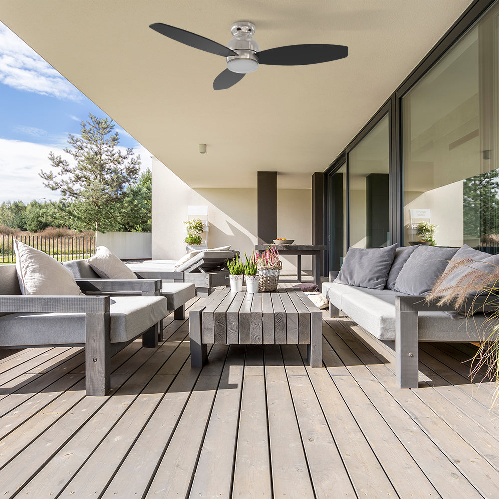 With modern design and a silent DC motor, this Trendsetter 52 inch flush mounted Wi-Fi ceiling fan in black is a stylish choice for any outdoor space. #color_Black